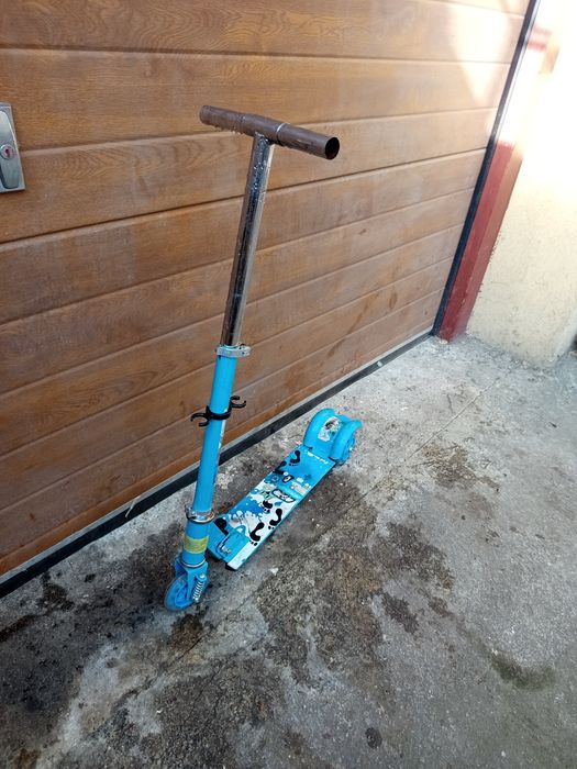 Trotina copii cu roti ajutătoare