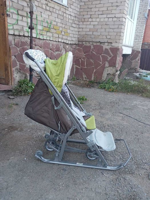 Детская санка с колесами