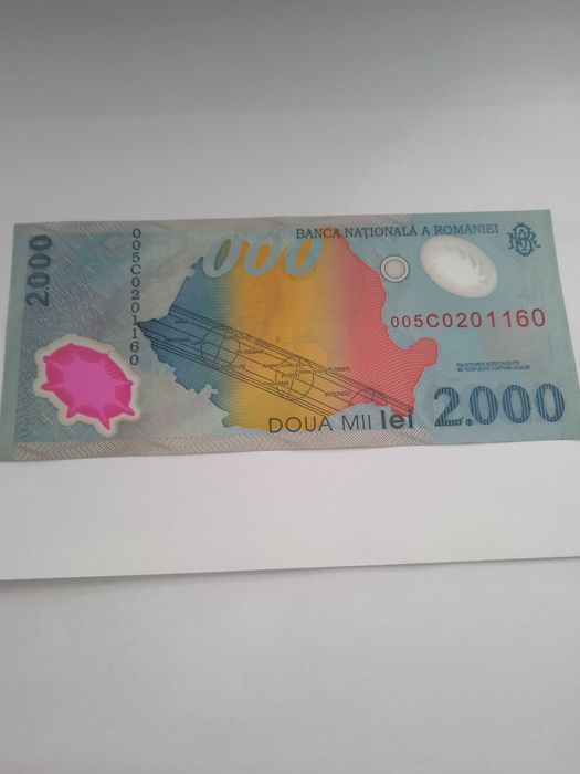 Bancnota de colecție, cu eclipsa, de 2000 lei, din 1999