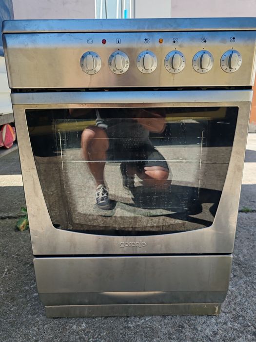 Иноксова свободно стояща печка с керамичен плот Gorenje с 2 години Гаранция