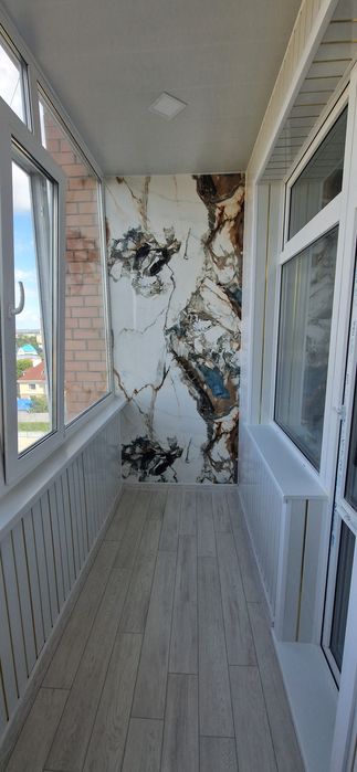 Обшивка балконов и остеклени