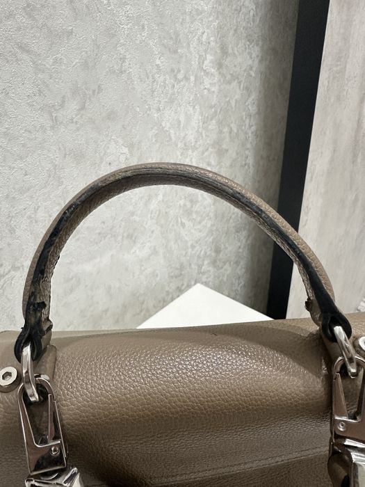 Сумка таза кожа