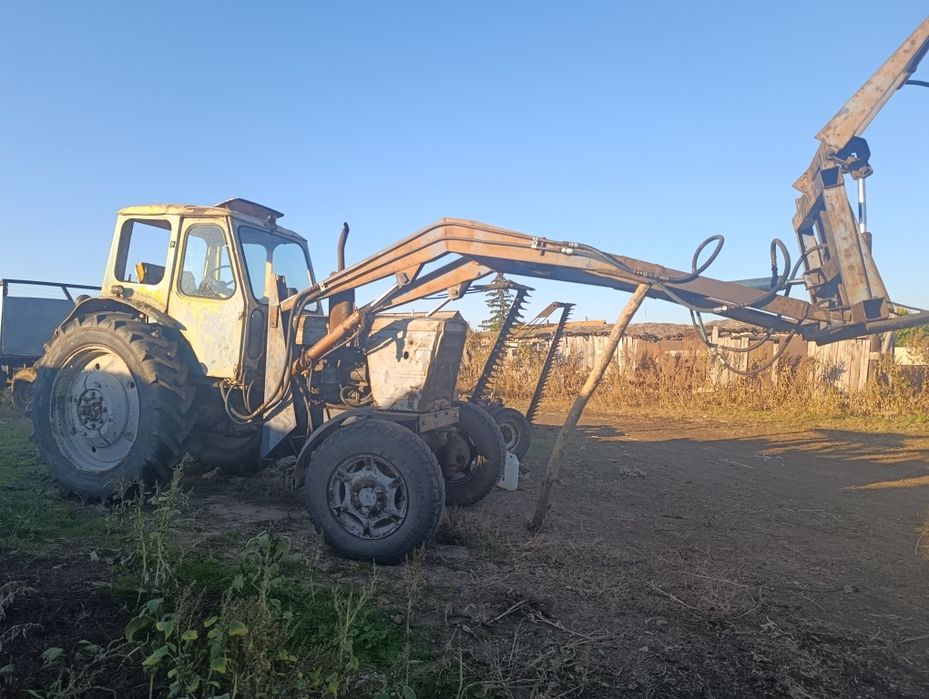 Продам два  трактора,косилку
