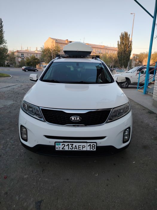Kia sorento 2013 год
