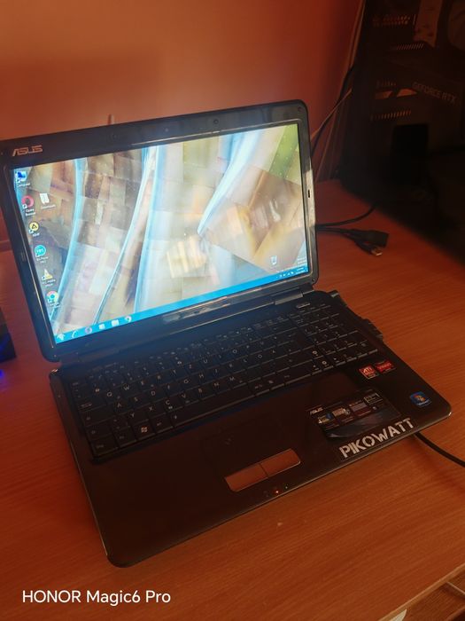 Laptop ASUS AMD Athlon Dual Core - Funcțional, cu cablu alimentare