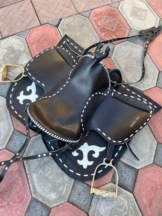 Подарок седло