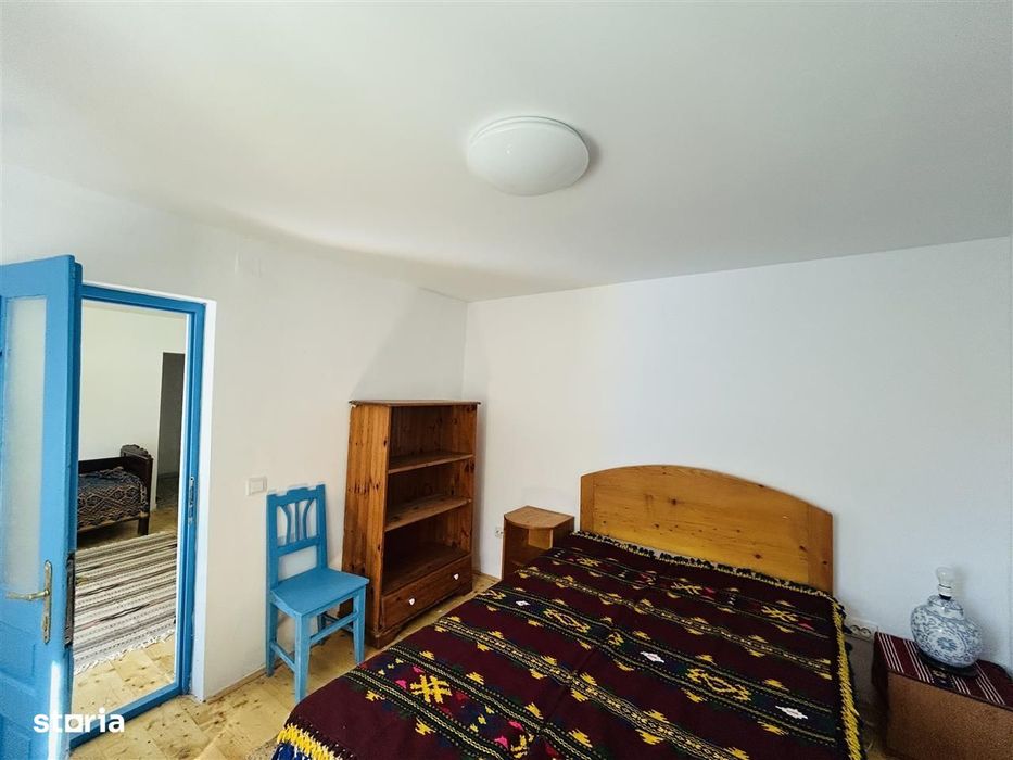 Casa individuala cu 2 corpuri de cladire si teren 625 mp