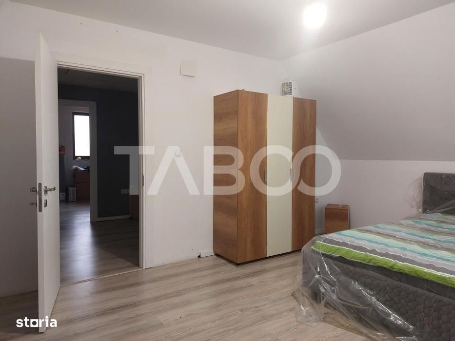 Casa individuala noua 4 camere P+M 144 mpu curte libera 416 Cisnadie