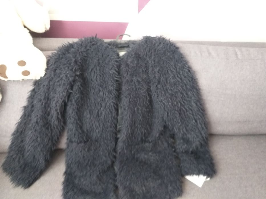 Меко ,пухкаво палтенце.