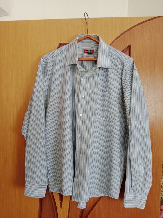 Рубашки мужские .