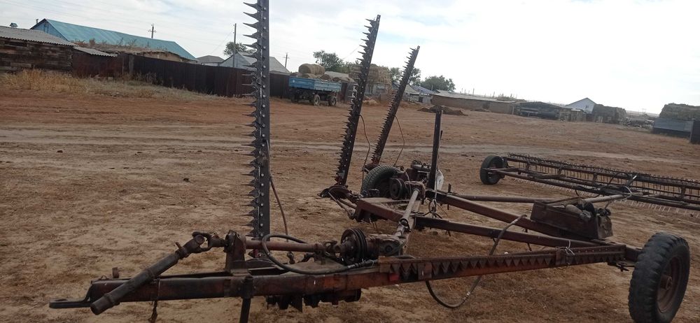 Продам трактор, пресс подборщик,косилка, тележка