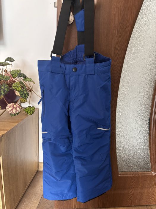 Детски непромокаем панталон Quechua и син гащеризон Lupilu