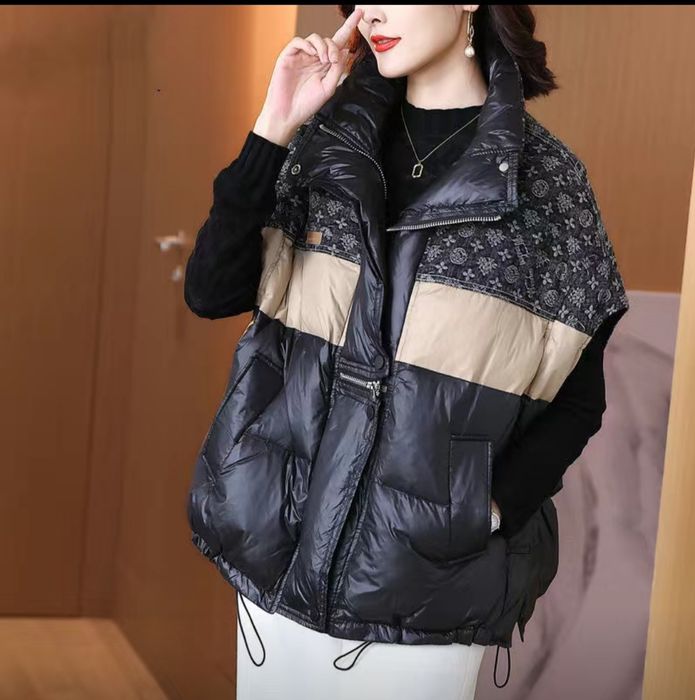 Безрукавка новая