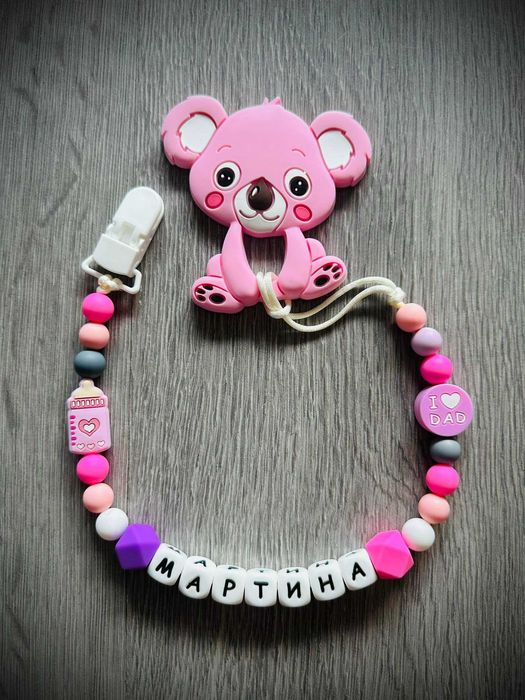 Клипс за биберон с гризалка