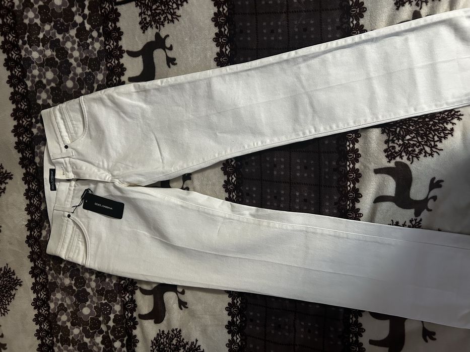 Продам мужской джинсы белый