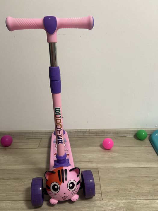 Самокат для девочки розовый