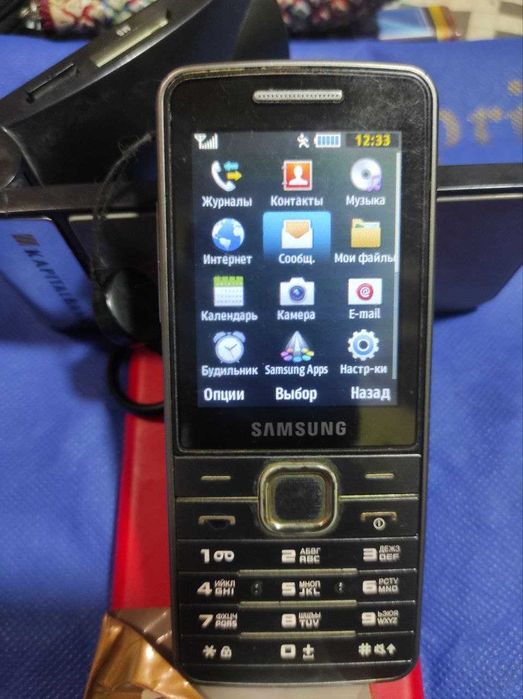 Samsung GT-S5610 Кнопочный, Мобильный телефон IMEI зарегестрирован.