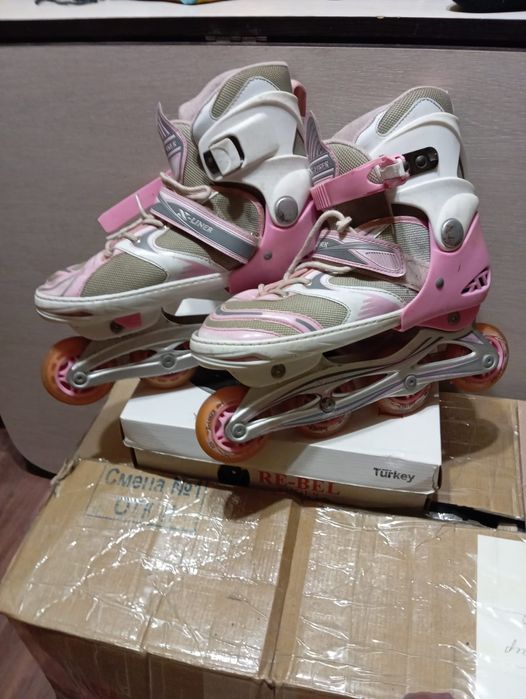 Роликовые коньки