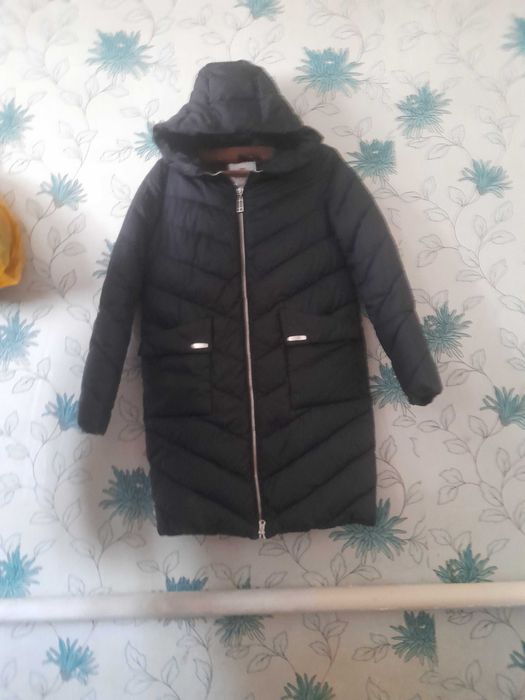 Продам женский пуховик