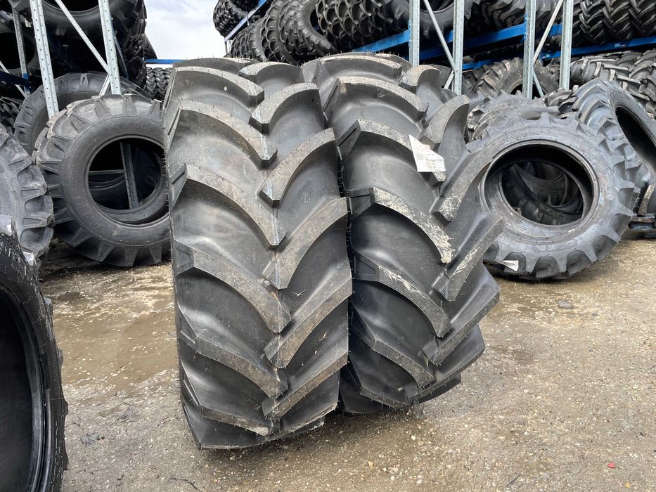 Cauciucuri noi 16.9-24 cu 10 pliuri pentru tractor fata marca OZKA