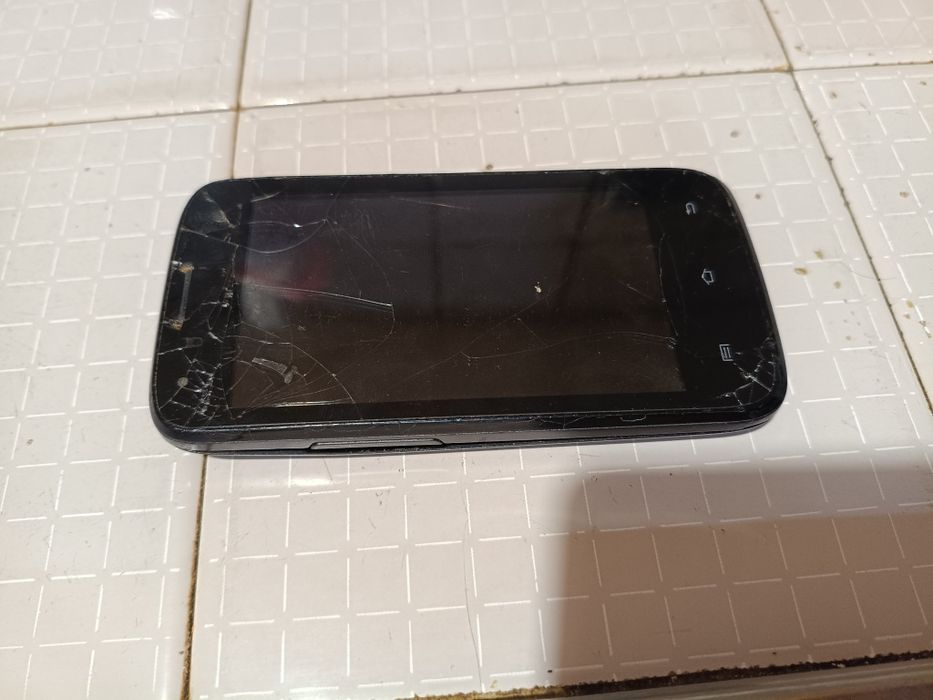 Телефони за части