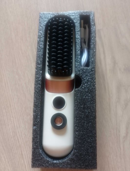 Perie pentru îndreptat părul cu efect de placă