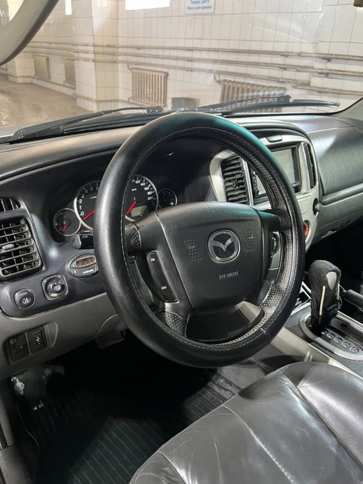 Продам Mazda Tribure