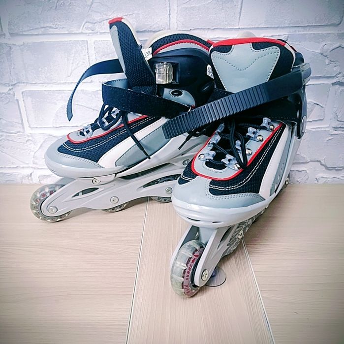 Роликовые коньки