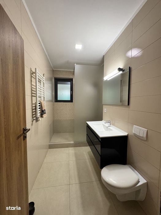 Apartament 3 camere, grădină 100 mp, parcare subterană, zona Tractorul