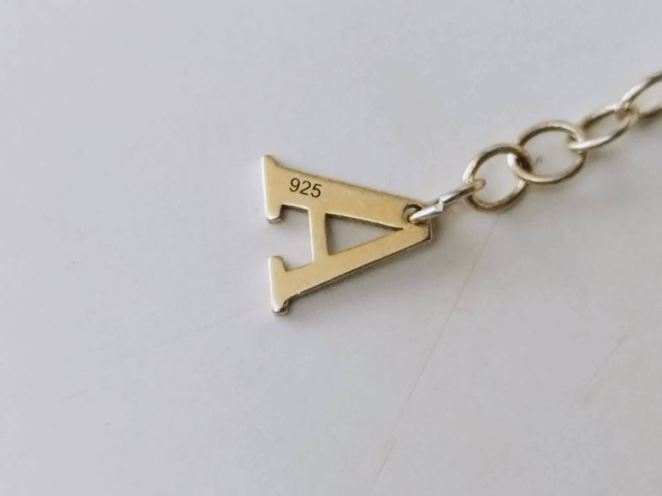 Veche bratara din argint de 925, placata cu aur, cu pandantiv infinit si prelungire cu litera A