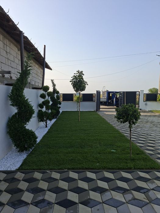 Amenajări grădini cu gazon si sistem de irigat