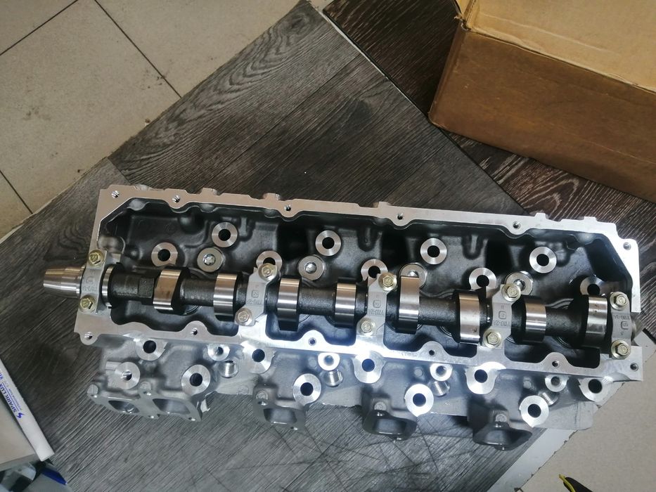 Гбц 1kz  головка блока цилиндров в сборе