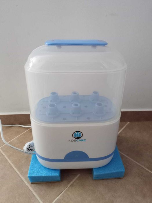 Sterilizator biberoane KidsCare ca nou, la cutie