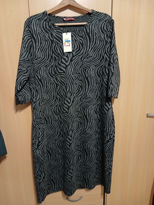 Нови, елегантни , три рокли.