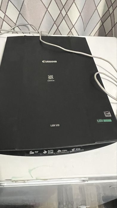 Обычный сканер Canon формата А4.