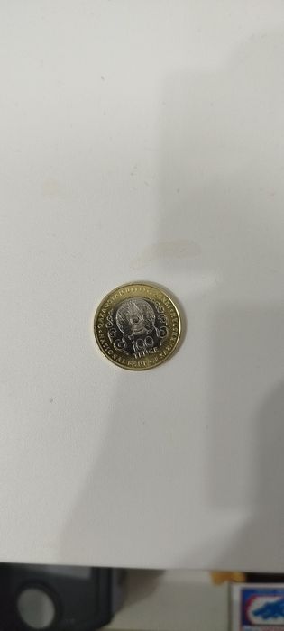 100 тенге монета