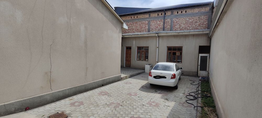 Продаётся дом, участок в Яккасарайском районе. Фасад 15м. Площадь 2,65
