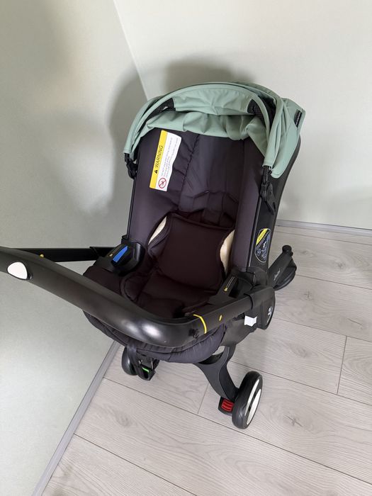 Продам коляску-автокресло Rolller