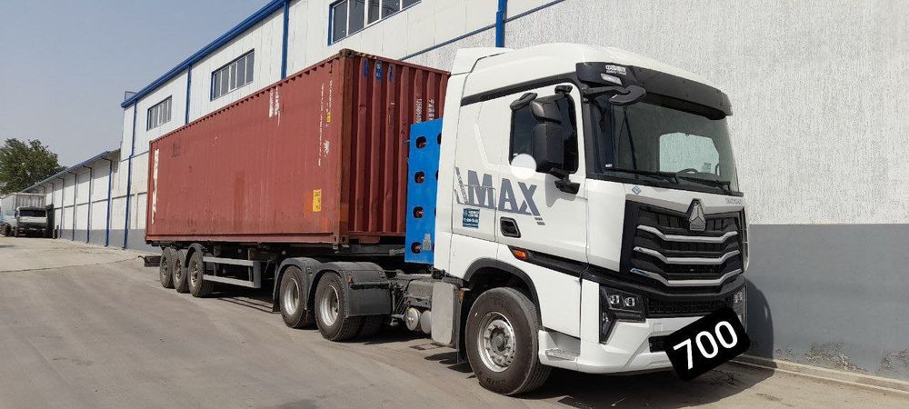 HOWO MAX Газли тягач + Контейнеровоз прицеп Сотилади