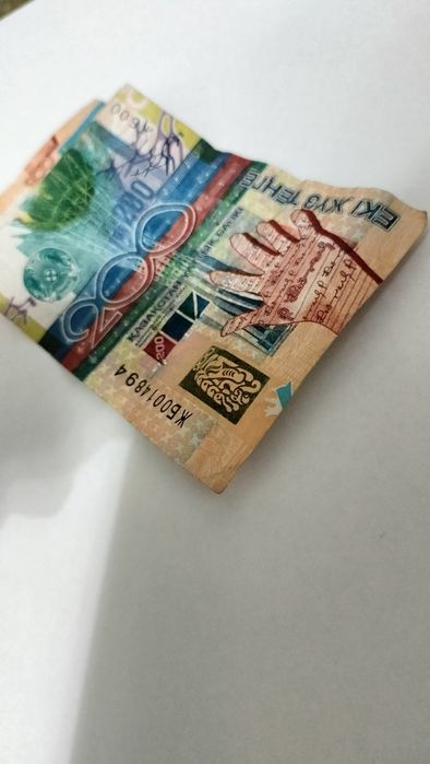 200 теңге год не Написан