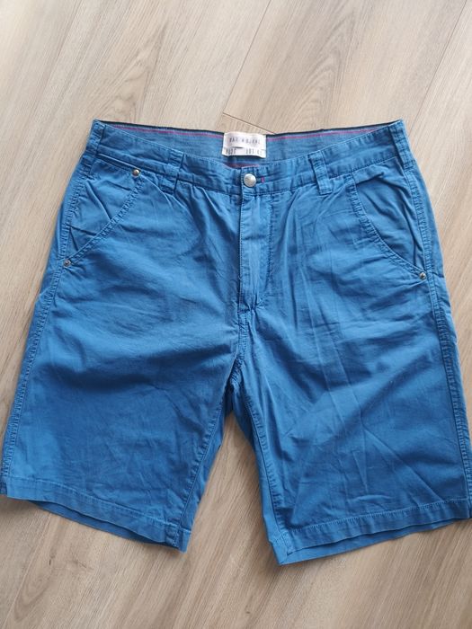 Blugi 42 (32)/ pantaloni scurți 40 (32-33)