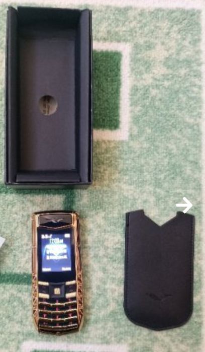 Мобилен телефон марка SERVO с две СИМ карти + кутия + зарядно + калъв