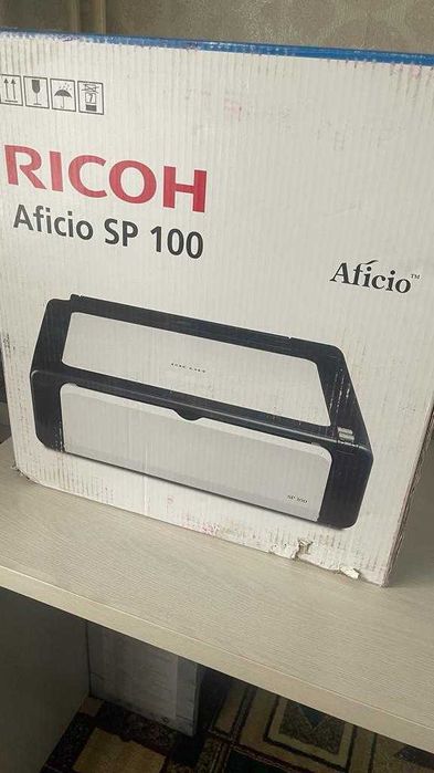 Принтер Ricoh Aficio SP 100