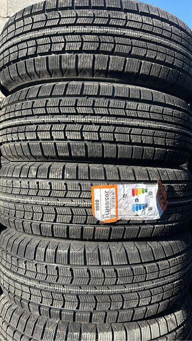 Новый Шины 185/65/14