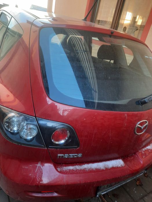 Capota.usi .interior Mazda 3