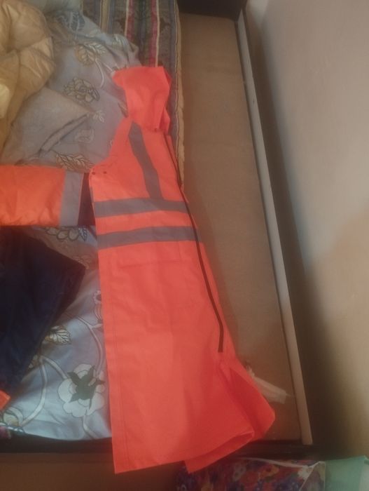 Дождевик новый..