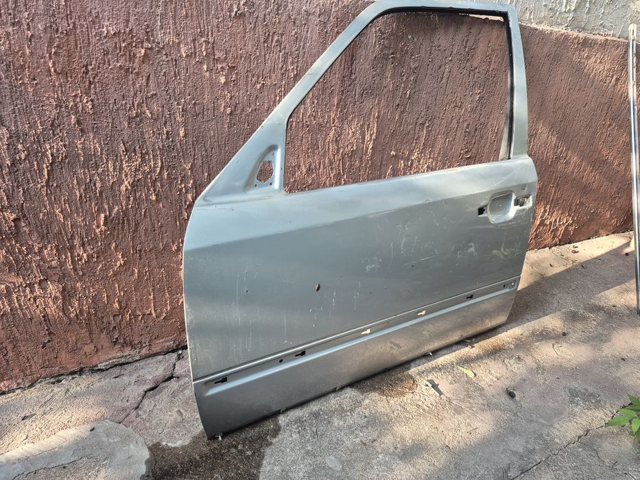 Дверь левая Mercedes W124