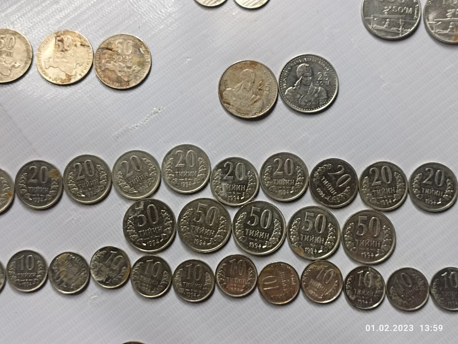 Старые монеты-тийин год1994,1997,1999,2000,2001,2009