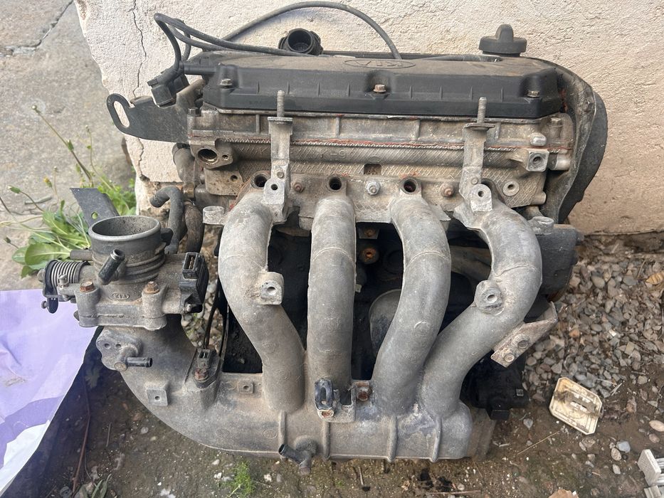 Двигатель и ЗП для киа рио 2005