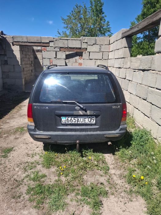 Nissan primera 1990 года
